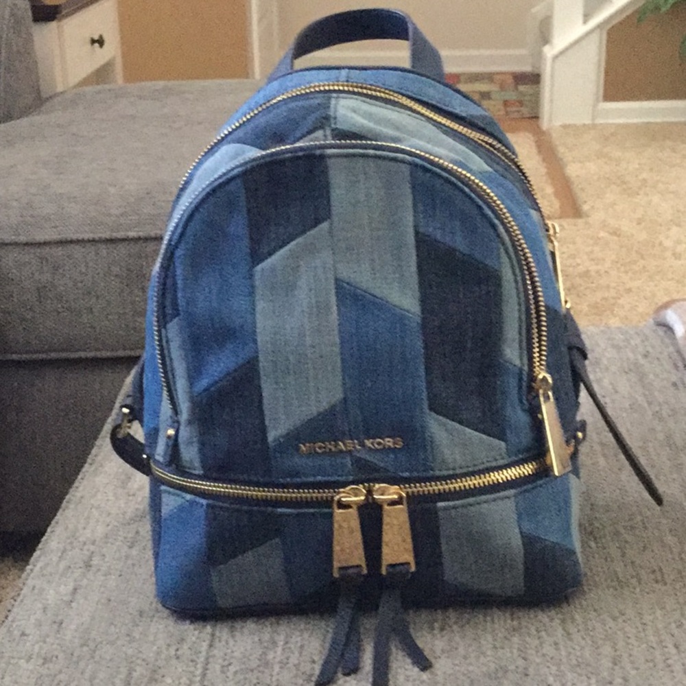 ⬇️Michael kors backpack